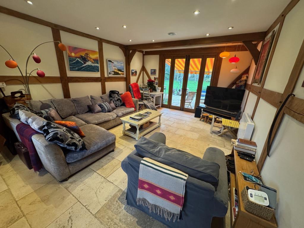 Lot: 43566 - COUNTRY ESTATE COMPRISING 5 BEDROOM MANOR HOUSE, WEDDING VENUE WITH 7 BEDROOM HOUSE, 6 ECO LODGES, 5 COTTAGES, 2 TENNIS COURTS, WORKSHOP AND ANCILLARY ACCOMMODATION - SET IN OVER 20 ACRES - Froggies-living room and study